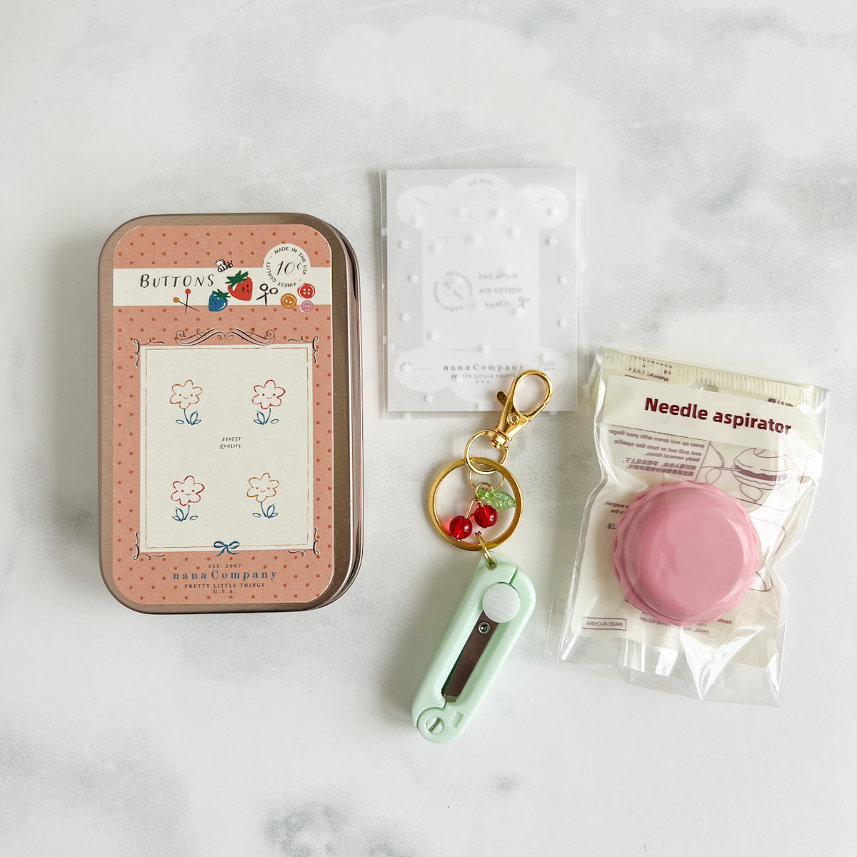 nanaCompany Buttons Card Sewing Tin Kit featuring Cherry Charm Retractable Scissors
