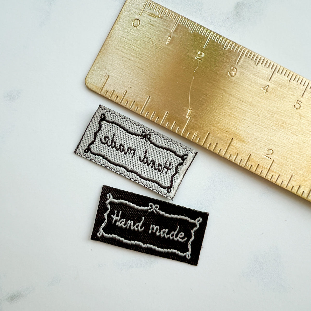 Bow-frame Hand made sew-on woven labels | Three Labels