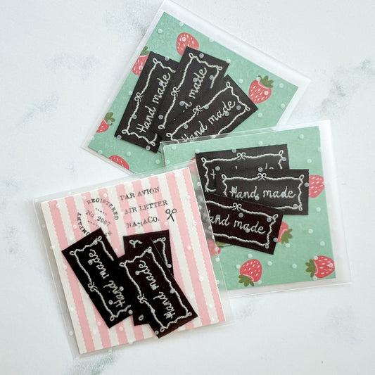 Bow-frame Hand made sew-on woven labels | Three Labels
