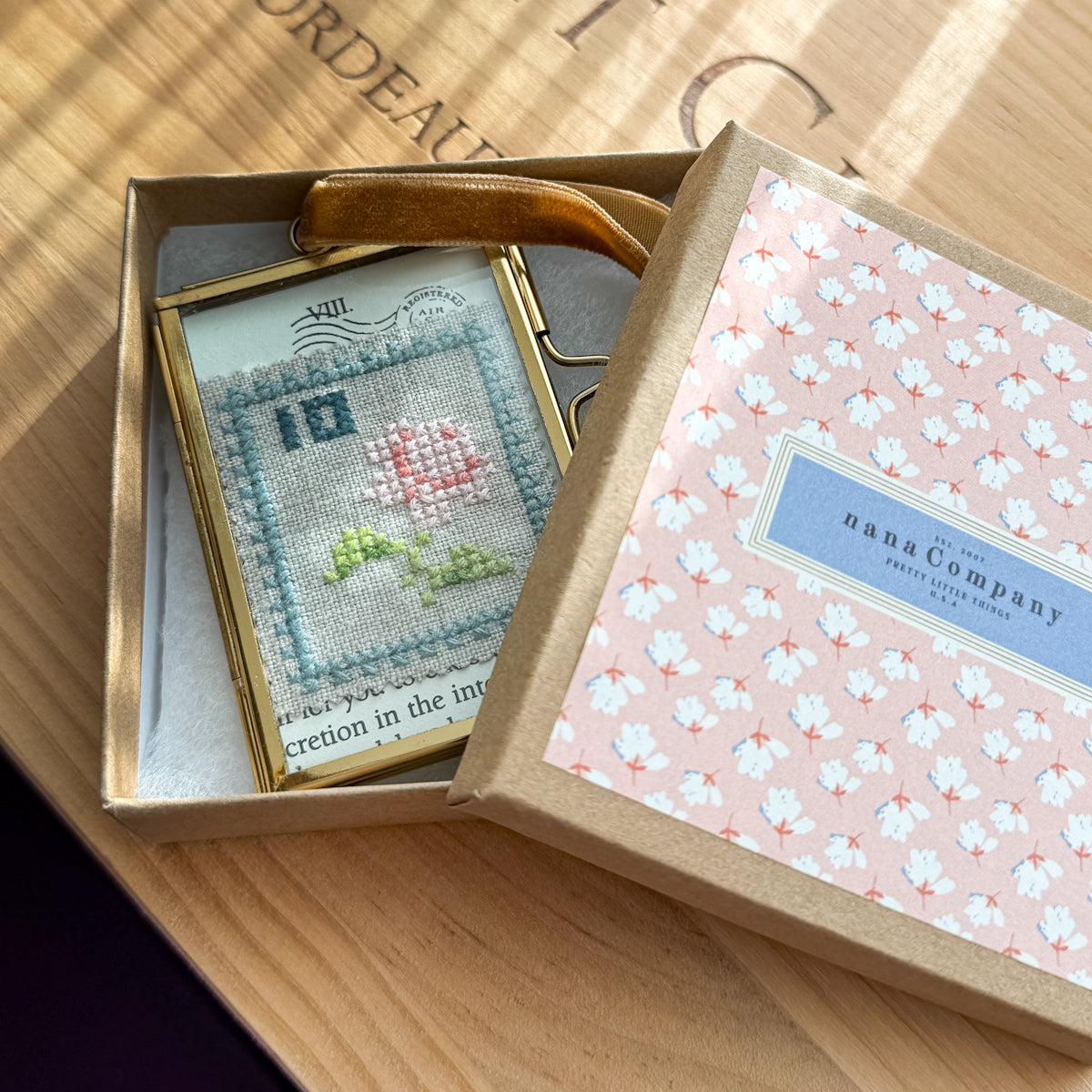 Glass-framed Cross-stitched Flower Postal Stamp Handmade by Amy Sinibaldi