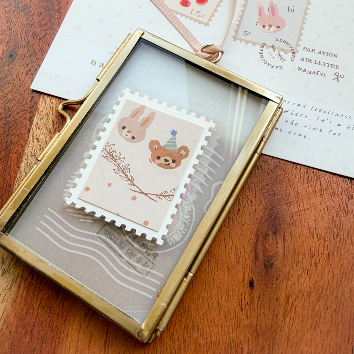 Glass-framed Cross-stitched Stamp Art Handmade by Amy Sinibaldi