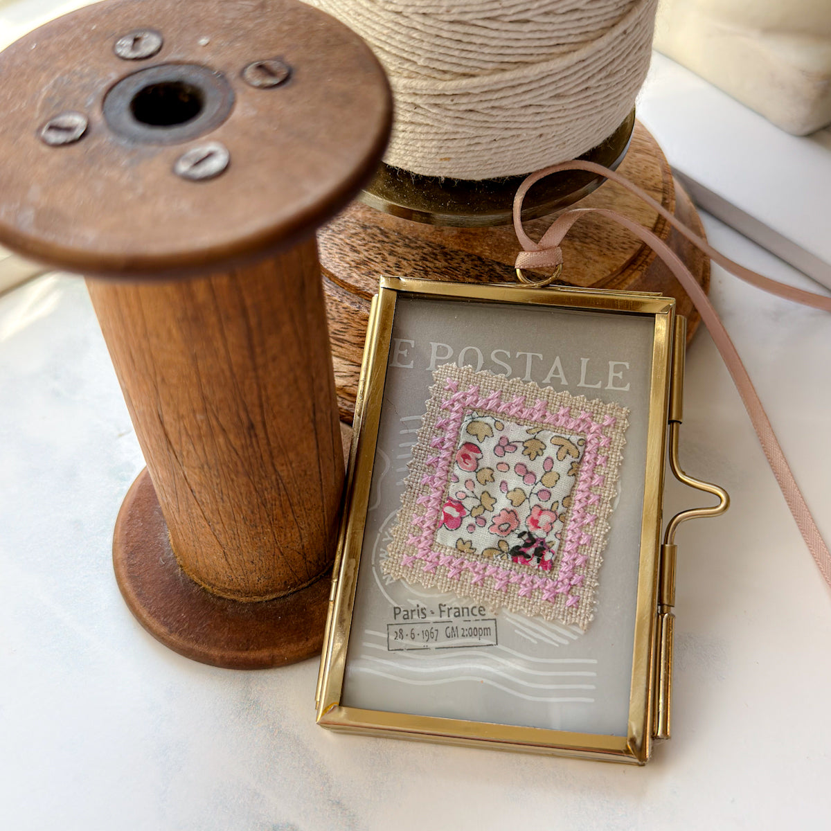Glass-framed Cross-stitched Stamp Art Handmade by Amy Sinibaldi