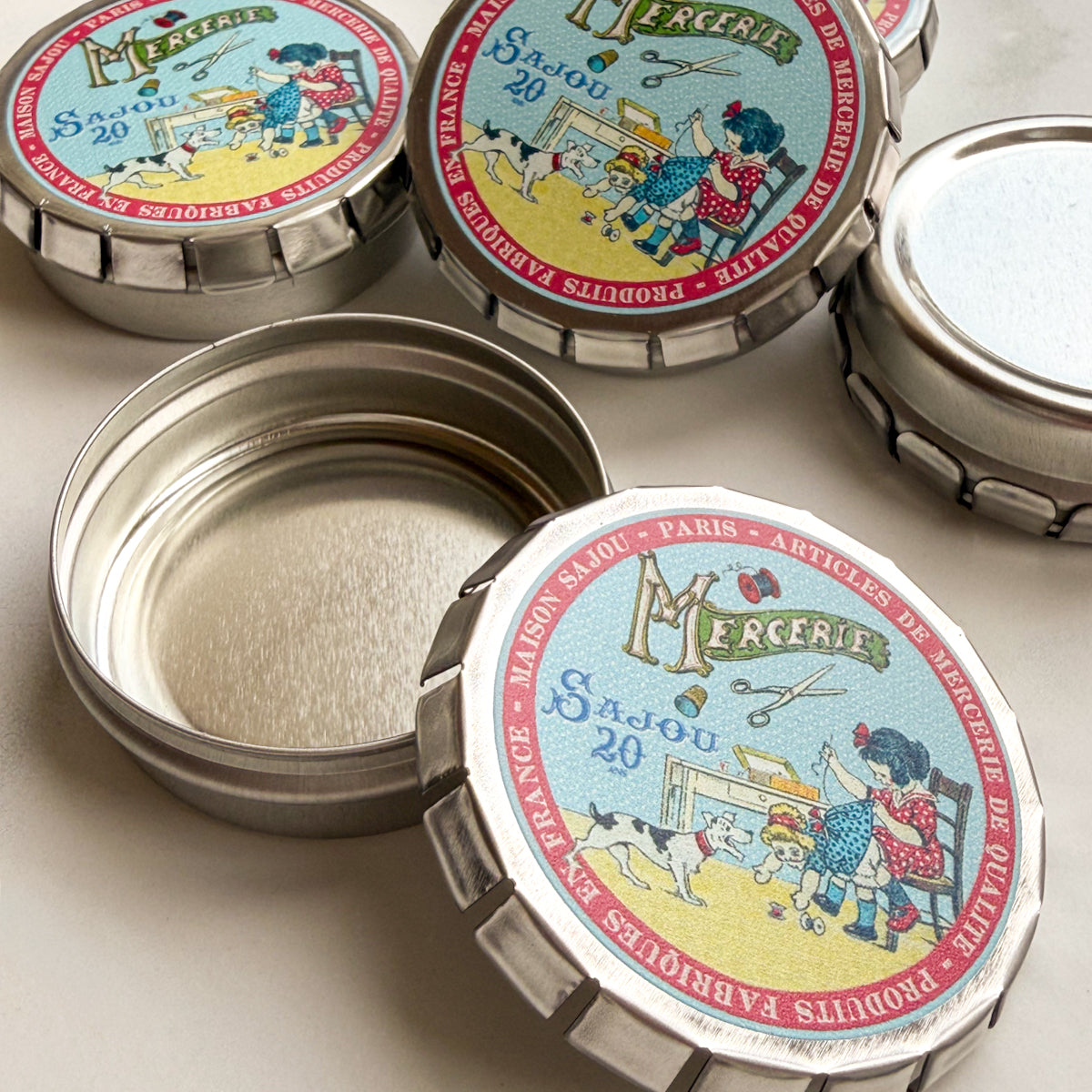 Sajou Little Girl Sewing Click-clack Tin