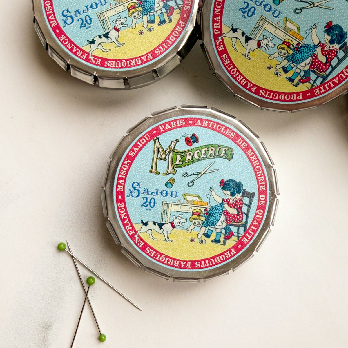 Sajou Little Girl Sewing Click-clack Tin